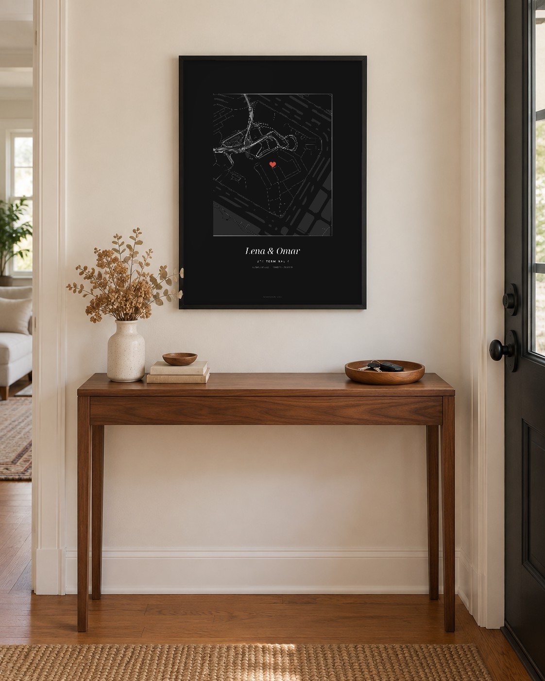 Street map poster centered on JFK airport with two names and a date, framed on a wall