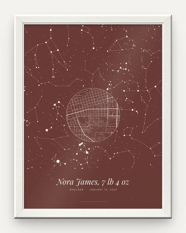 Birth star map poster in a white frame, an example: the whole night sky in Blush over Boulder, Colorado, on January 18, 2026, a round street map of Boulder with a small heart, and the line Nora James, 7 lb 4 oz