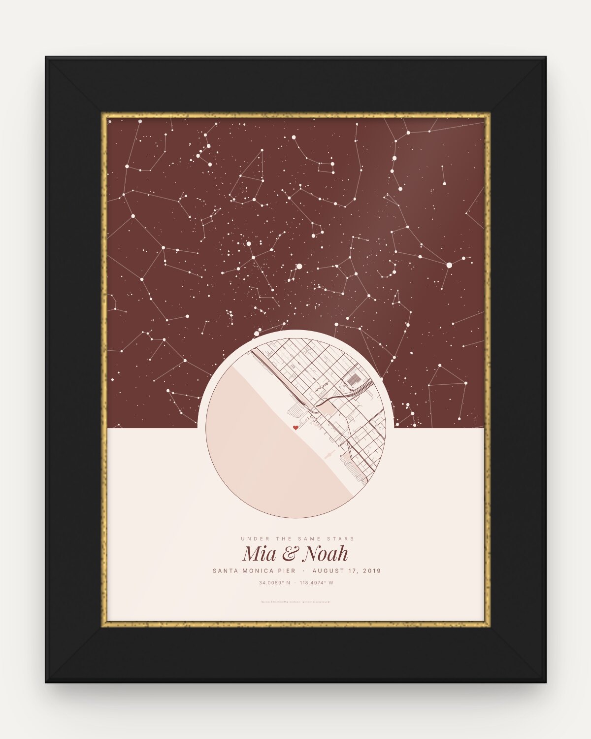 Wedding star map in Blush in a black and gold frame: the night sky over Santa Monica Pier on August 17, 2019, a round street map of the pier, the words Under the same stars and the names Mia & Noah